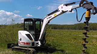 Аренда экскаватора погрузчика с ямобуром в Карасук цена от 1551 руб
